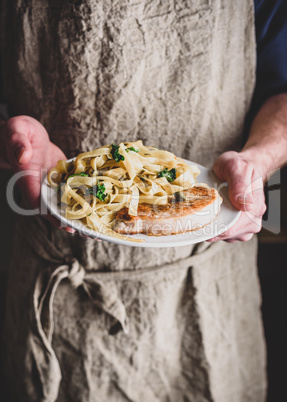 Pork chop steak and pasta with capers