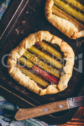 Rhubarb mini galettes on baking sheet