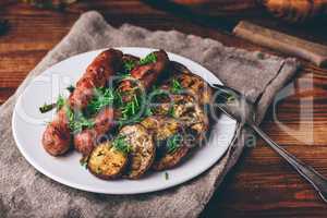 Baked Pork Sausages with Eggplant Slices
