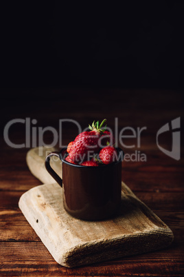 Fresh ripe strawberries in mug