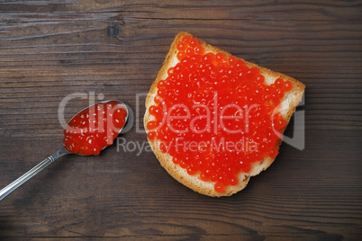 Red caviar, sandwich, spoon