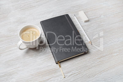 Notepad, coffee cup, pencil, eraser