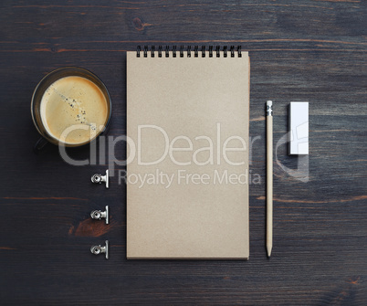 Sketchbook, pencil, eraser, coffee cup
