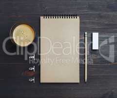 Sketchbook, pencil, eraser, coffee cup