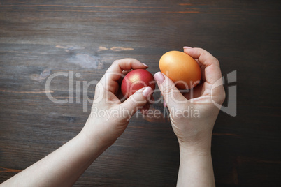 Easter eggs in hands