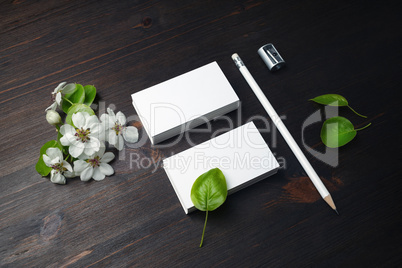 Business cards, pencil, sharpener, flowers