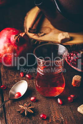 Black tea with pomegranate seeds and some spices
