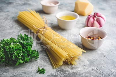 Raw ingredients for linguine with olive oil and garlic