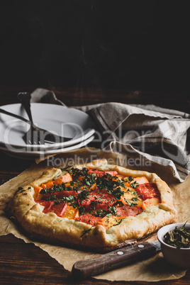 Baked tomato galette on baking paper