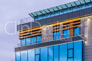 Modern high-rise building with a glass facade.