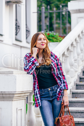 Woman standing on the staircase