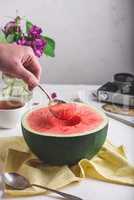 The Spoon with Piece of Watermelon in Hand