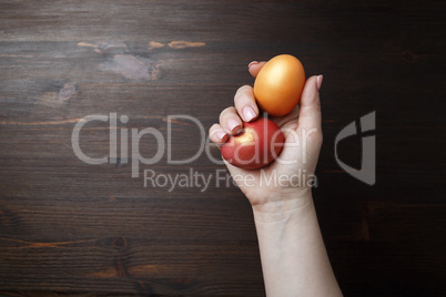 Easter eggs in female hand