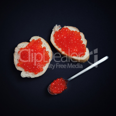 Sandwiches, red caviar, spoon