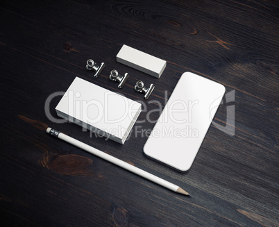 Smartphone, business cards, pencil, eraser