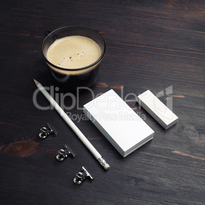 Coffee, business cards, pencil, eraser