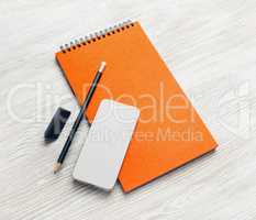 Notebook, smartphone, pencil, eraser