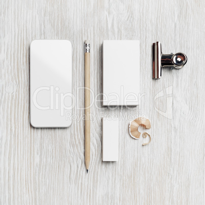 Smartphone, business card, pencil, eraser