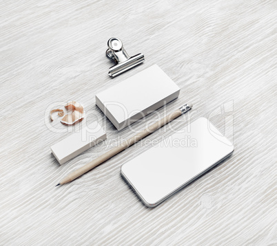 Business cards, smartphone, pencil, eraser