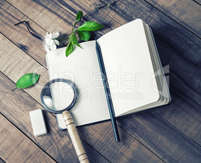 Notepad, magnifier, pencil, eraser