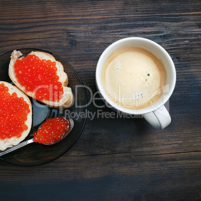 Coffee, sandwiches, red caviar