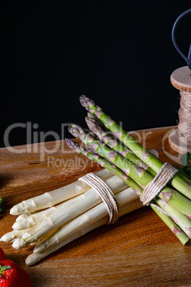 Green and white asparagus on the table