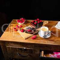 Chocolate cake with raspberries and coffee