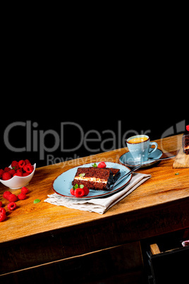 Rustic chocolate cake with raspberries and coffee