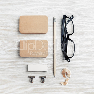 Business cards, glasses, pencil, eraser