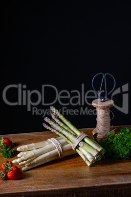 Green and white asparagus on the table