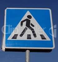 pedestrian crossing sign on street