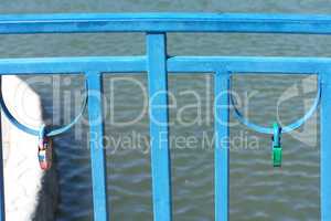 railing over pond at dry sunny summer day