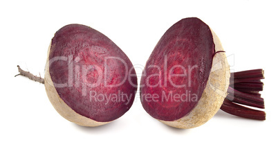 Red table beets in section isolated on white background.