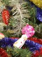 many of toys on green christmas fir