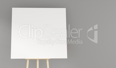 Wooden easel with a blank canvas