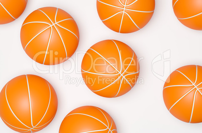 Many basketballs ona bright background