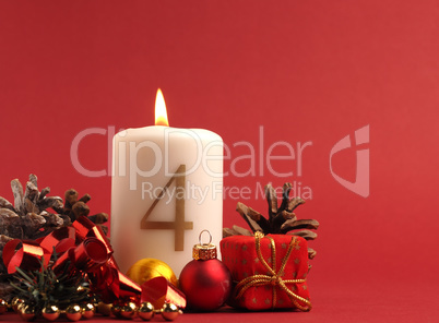 White candle with the number four burns, Advent background