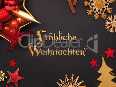 German words joyful Christmas with golden and red Christmas item