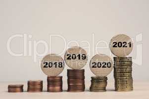 Stacked coins on a table, financial concept