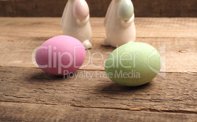 Naturally colored organic eggs on a rustic table