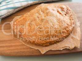 Vegetable pate from the oven on a rustic wooden table, view from