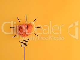 Crumpled paper ball as a lightbulb, conceptual business image fo