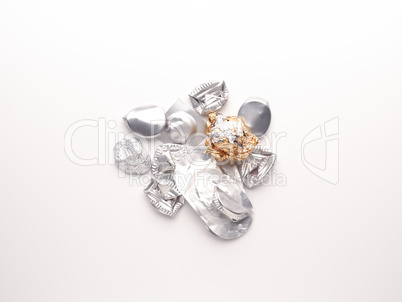 Aluminum waste on a white background, aluminum in daily use