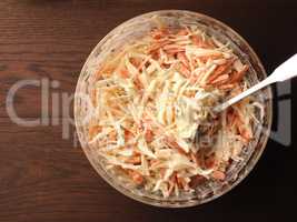 Traditional white cabbage salad with carrots ,chives, natural yo