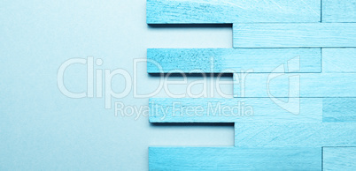 Solid wood parquet in blue as wood texture on blue background wi