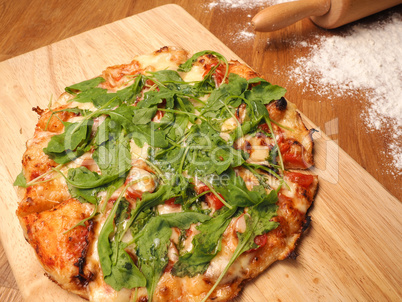 Delicious Vegetarian Pizza on a wooden board