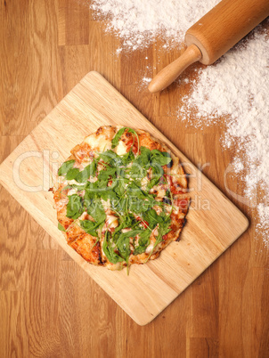 Delicious Vegetarian Pizza on a wooden board