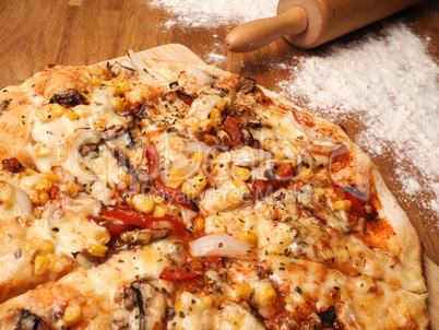 Delicious Vegetarian Pizza on a wooden board