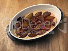 Plum cake in a baking dish