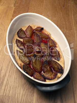 Plum cake in a baking dish